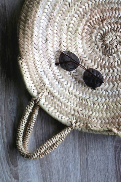 istock Wicker Bag and Sunglasses 1313470183
