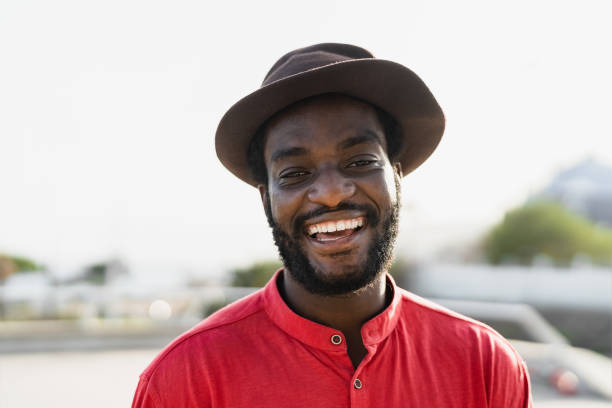 istock Happy african man having fun smiling in front of camera 1313474276