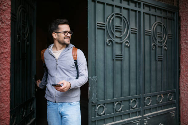 istock Happy young Caucasian man going outside 1313476741