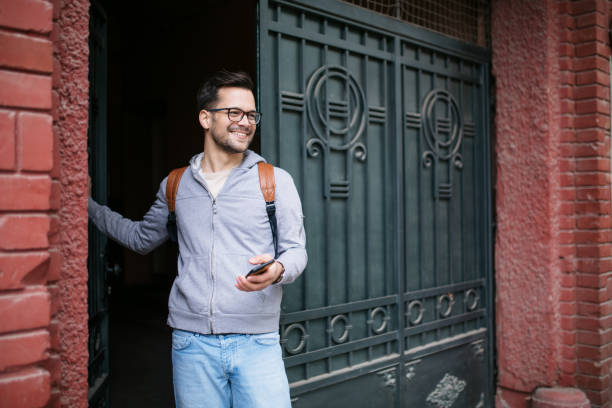 istock Happy young Caucasian man going outside 1313476786