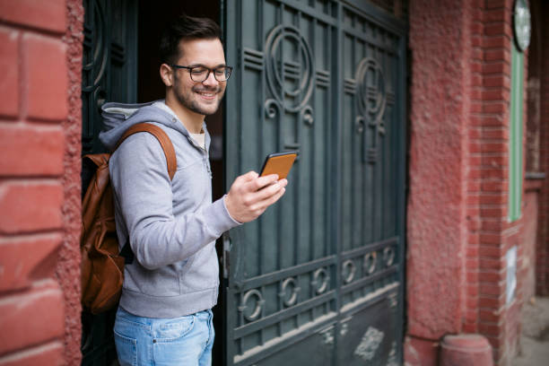 istock Happy young Caucasian man going outside 1313476801