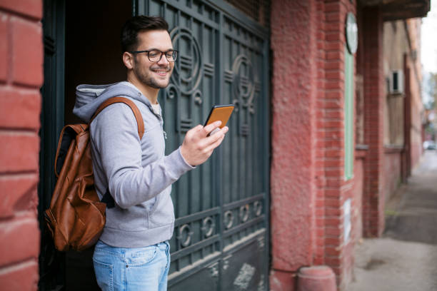 istock Happy young Caucasian man going outside 1313476819