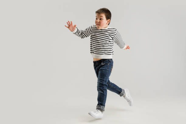 istock Caucasian boy isolated on white studio background. Copyspace. Childhood, education, emotions concept 1313477001