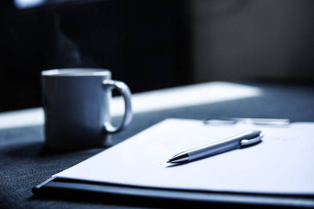 Blank Papers For Writing Something, Pen And Coffee In A Mug
