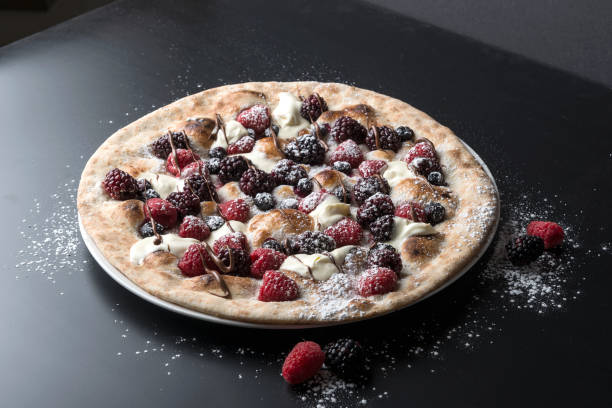 istock Dark and White Chocolate berry pizza 1313481164