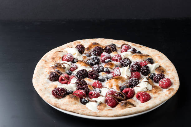 istock Dark and White Chocolate berry pizza 1313481213