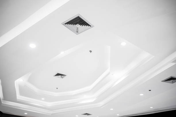 istock White ceiling with lights and bulbs details Decorated in white and beautiful angled. 1313481767
