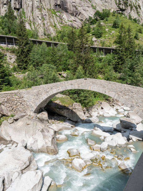 istock Old roman bridge in Switzerland 1313482022