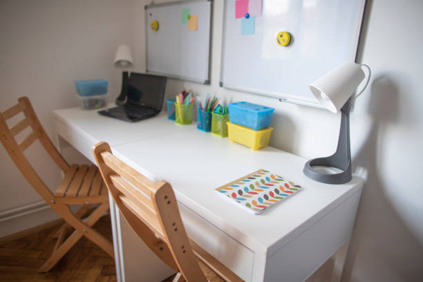 istock Desk with learning supplies at the kids room 1313484705