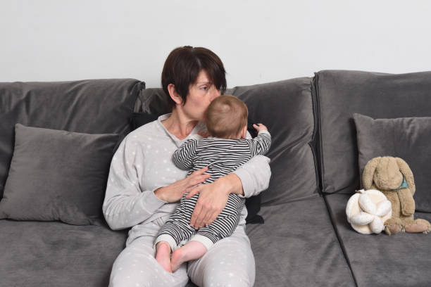 istock mother and baby at home 1313485025