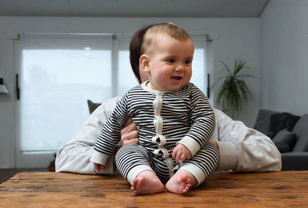 istock mother and baby at home 1313485123