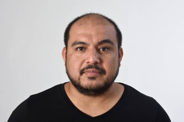 istock portrait of a latin man 1313487715