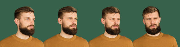istock Evolution of emotions. Caucasian man's portrait isolated over green studio background with copyspace 1313489044