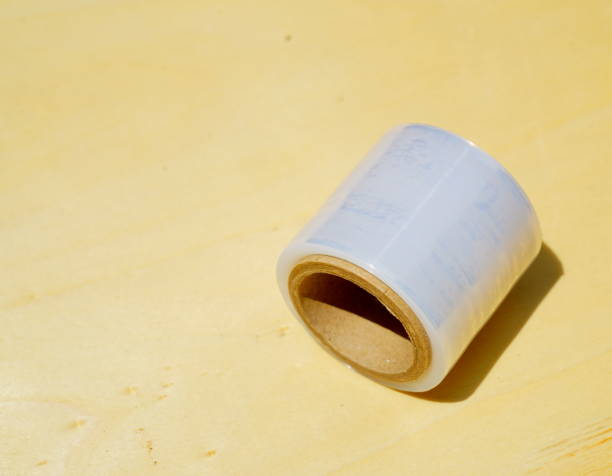 istock Small Roll of wound white transparent film for wrapping with tree 1313491162