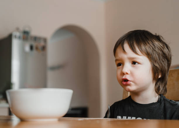 istock A little boy doesn't want to eat his breakfast 1313491900