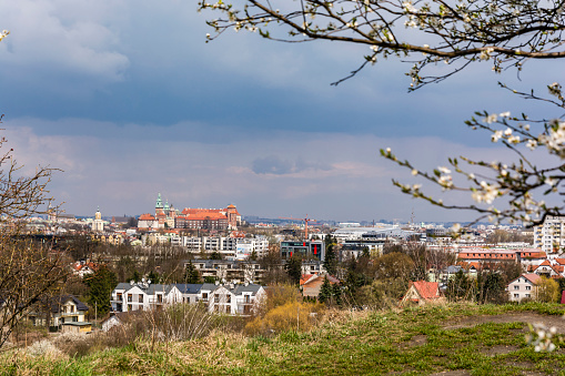 Krakow, Poland - April 20, 2021: The city of Krakow and the Wawel Royal Castle towering over it.