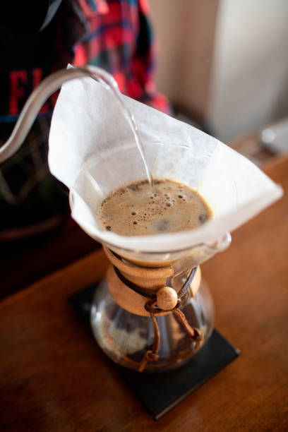Hot water pouring into pour-over coffee