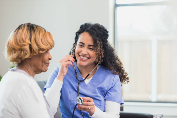 istock Nurse prepares to check senior patient's heart 1313504613