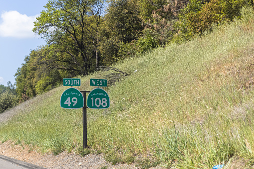 A Route 49 sign in Sonora, California in Tuolumne County, taken in the early afternoon.