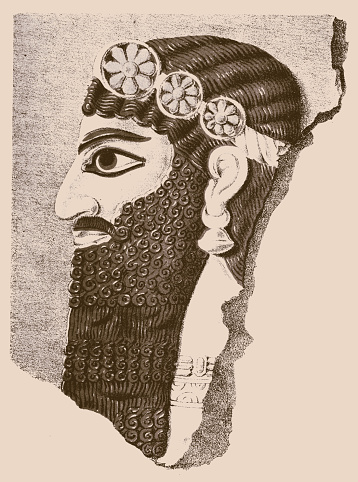 Illustration of a Assyrian. It is made of stone and is the face on one side. It has a lid like a crown