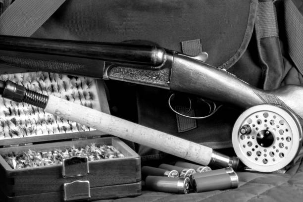 istock Monochrome Assorted Shooting and Fishing Equipment 1313508365