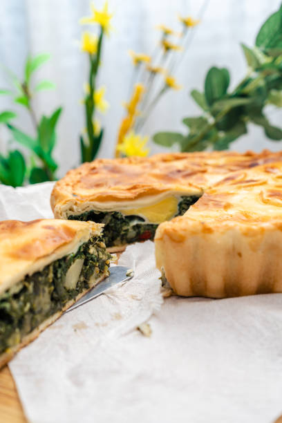 istock Spinach Pie with Egg or Spinach Quiche Lorraine. Salty tart with vegetables, spinach and egg. Home food, healthy and natural concept. 1313509479
