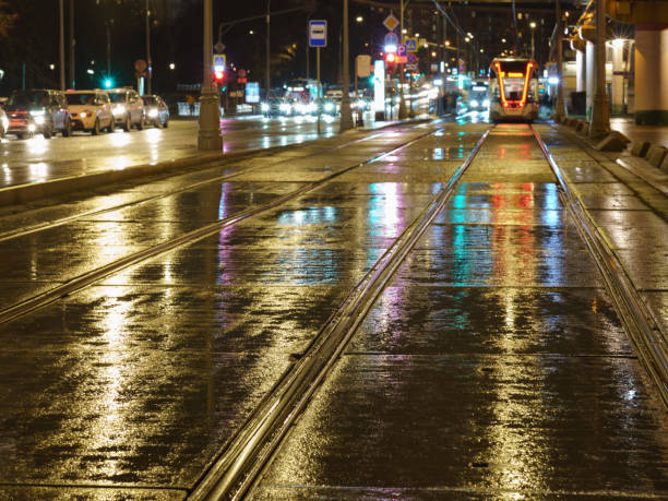 Blurred photography of cars motion. Big traffic in city. Urban highway filled out by cars. Rush hours. To be late. Work out. Suitable for greeting card design, background, postcard template, poster