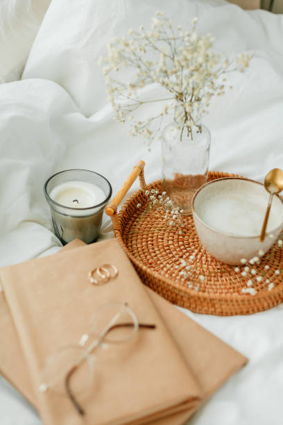 istock Breakfast in bed, cappuccino, wicker tray, spring, home decor. Cozy. 1313514683