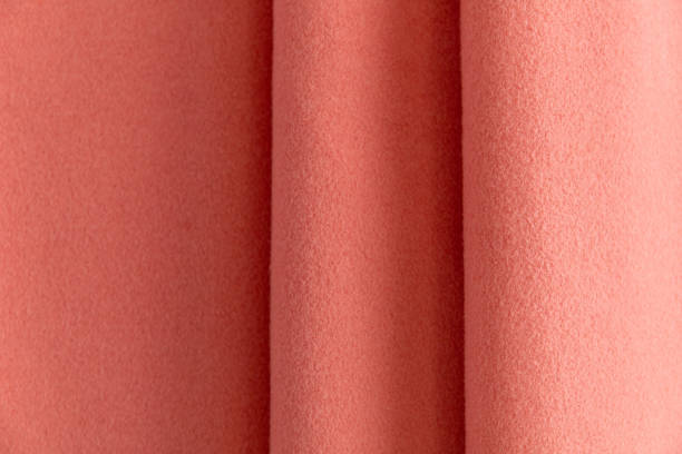 istock terracotta fleece surface draped with folds, background 1313517263