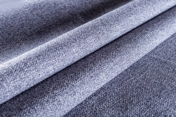 istock dense upholstery fabric in lavender color with linen texture, pleated drapery 1313517316
