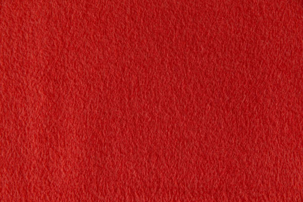 istock smooth surface of bright red fleece, background, texture 1313517318