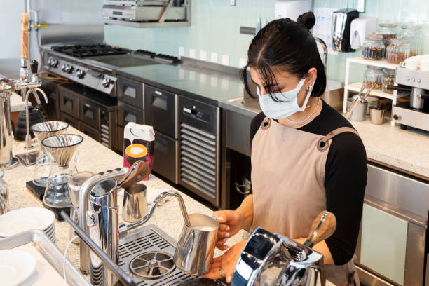 istock Barista is making coffee 1313518660