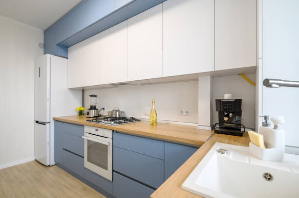 Modern blue-teal colored furniture kitchen interior