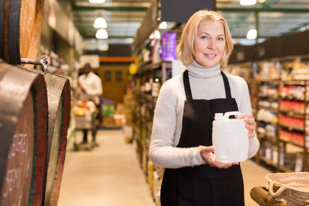 istock Saleswoman offering wine on tap 1313524904