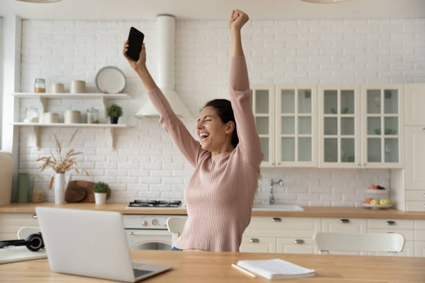 istock Euphoric young lady freelancer meet deadline with all work done 1313525193