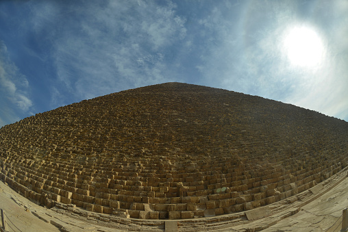 Fisheye shot of the pyramids from the Giza Plateau on a sunny day in Cairo, Egypt.  The Pyramid Fields from Giza to Dahshur is on UNESCO World Heritage List\