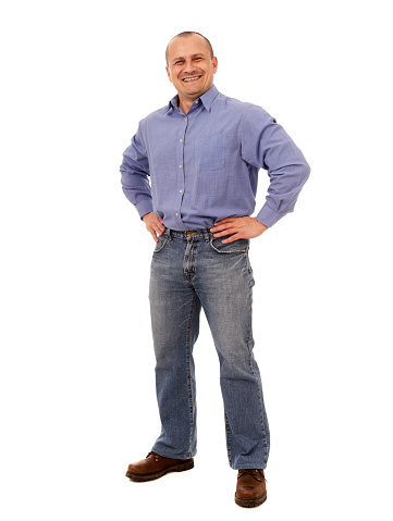 Happy smiling caucasian businessman with hands on hips, full body shot on white background, isolated