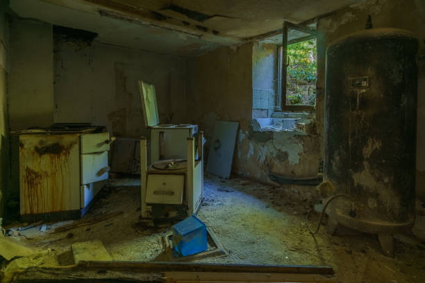 istock abandoned kitchen inside destroyed house with old rusty steel water tank 1313529011
