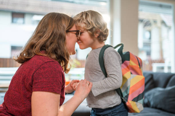 istock Caucasian Mother Helping Her Son Get Ready For School 1313530250