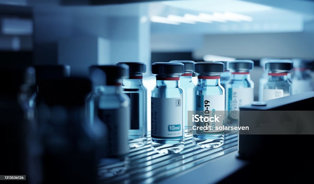 Production of Covid-19 Vaccine Vials In Cold Storage Bottle vials of Covid-19 vaccine production in cold refrigerated storage. Pharmaceutical 3D illustration. Vaccination Stock Photo