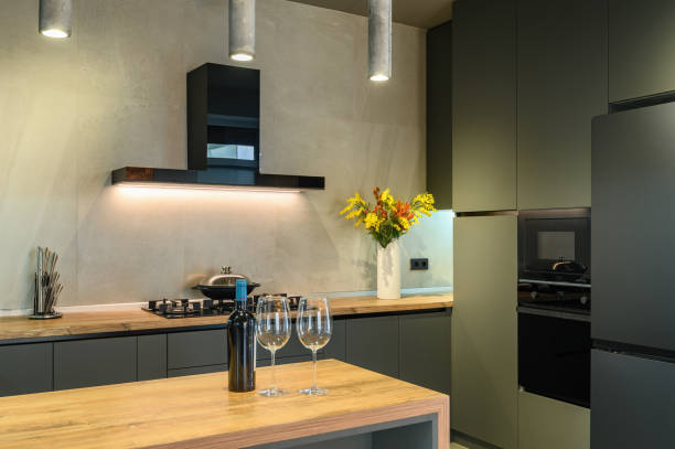 istock Modern large luxury dark gray kitchen closeup 1313539877