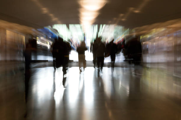 istock People Rushing in Modern Corridor 1313541538