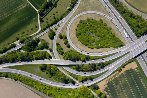 istock Traffic on highway junction from above 1313543611