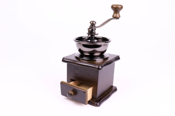 istock Retro Hand Made Coffee grinder on white background 1313545575
