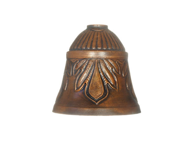 istock Bronze decorative bell decorated with floral ornaments isolated on a white background. 1313550900