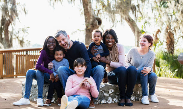 istock Blended family with five children outdoors at a park 1313553055