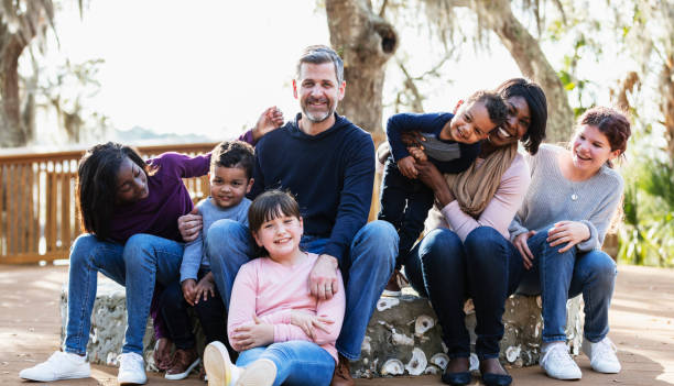 istock Blended family with five children outdoors at a park 1313553110