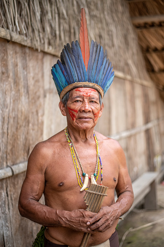 Manaus, Amazonas, Brazil - March 02, 2019: An Indian in his village in the Amazon rainforest