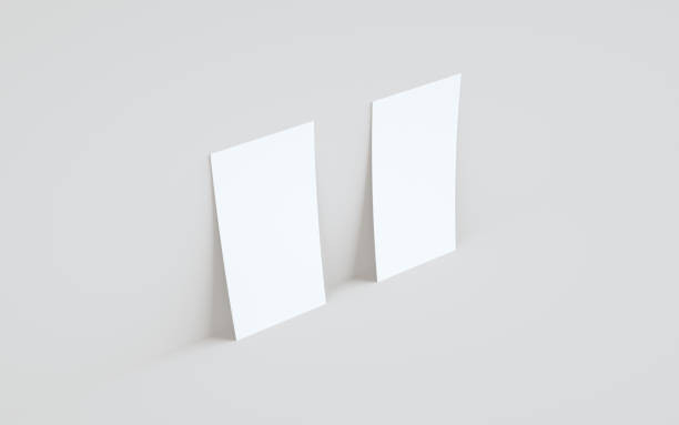 istock DL Flyer / Invitation Mock-Up - Two Flyers Against Wall Background 1313556910
