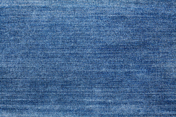 istock Blue jeans texture closeup, jean textile background, blue color denim backdrop, jeans pattern design, indigo cotton jean cloth, grunge fabric, material, fiber, blank frame, wallpaper, empty copy space 1313558072